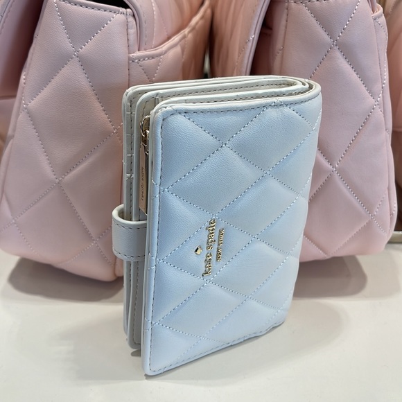 Kate Spade Carey Medium Compartment Bifold Wallet 
COLOR: Parchment - Picture 3 of 16